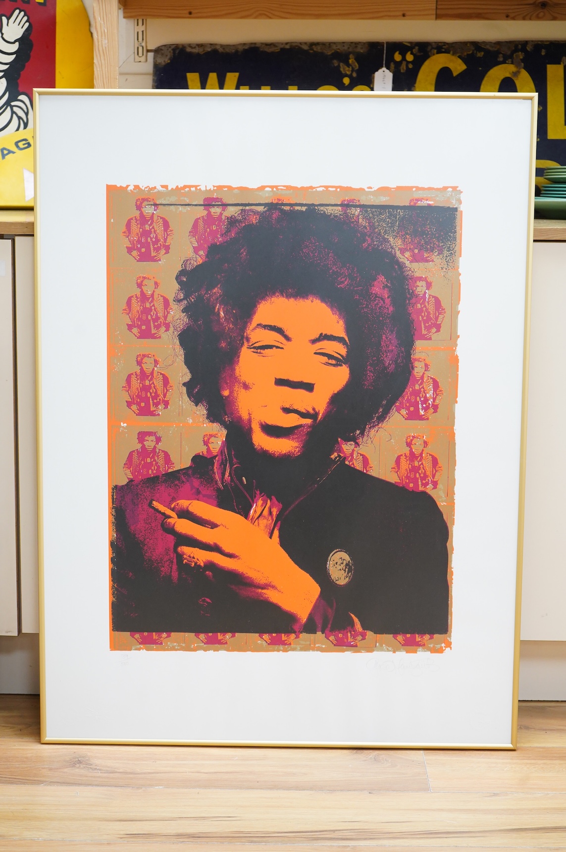 Jimi Hendrix interest; a framed silkscreen print by Gered Mankowitz (b.1946), of Jimi Hendrix, titled ‘Purple Haze’, signed by Mankowitz in pencil and limited edition 139/500, blind stamped, 101 x 75cm